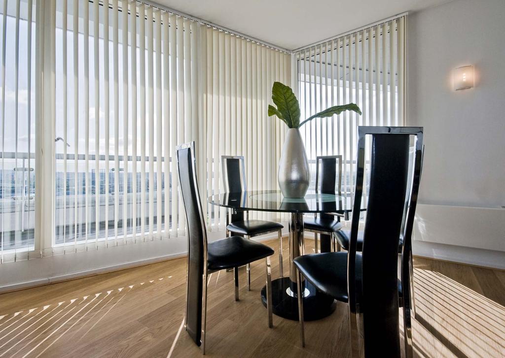 Select Textured Vertical Blinds in Manhattan White filtering daylight